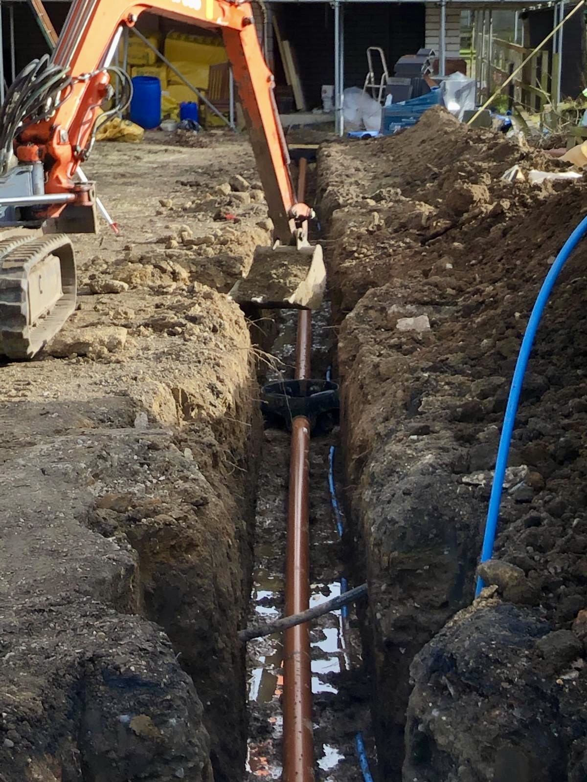 Pipework and inspection chamber in the new trench