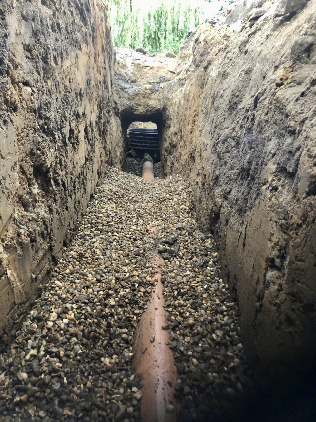 Pipe bedded in shingle before backfill