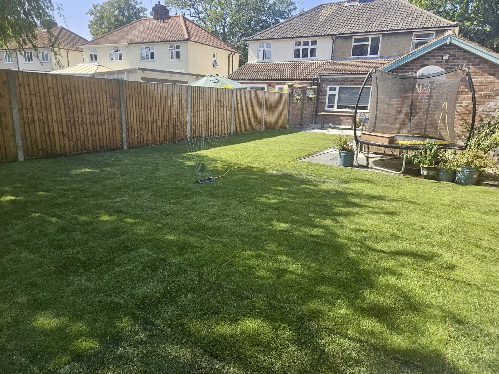 Close board fencing and turf laying